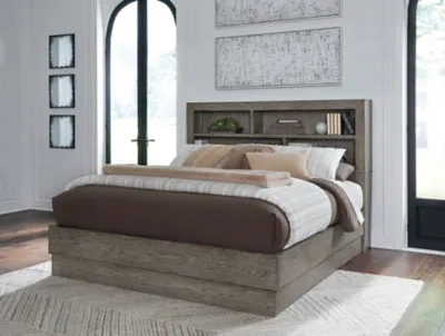 Anibecca King Bookcase Bed with Mirrored Dresser